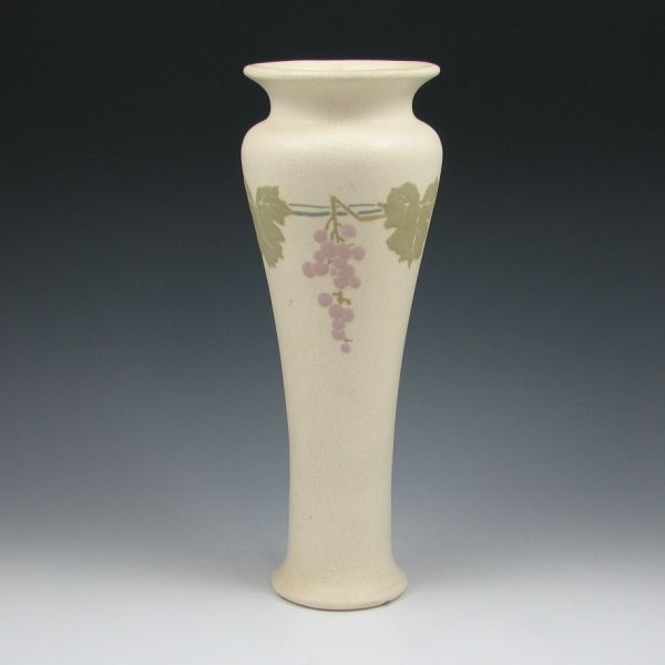 Appraisal: Slender Weller vase in ivory with slip-decorated grapes and leaves