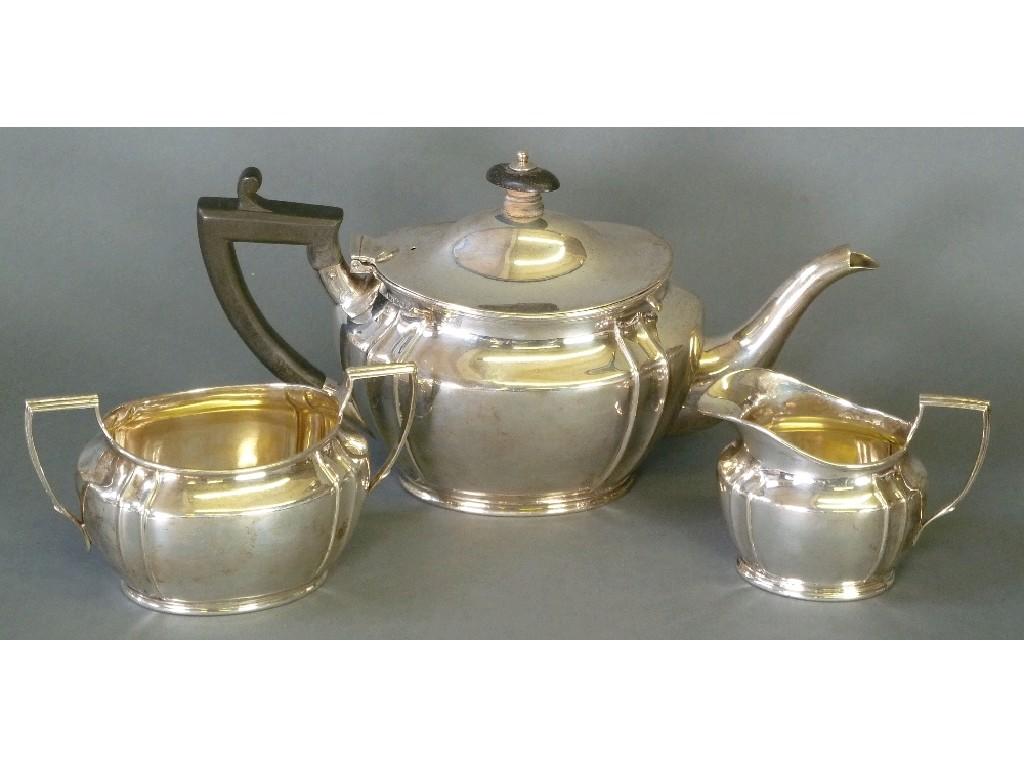 Appraisal: EARLY TWENTIETH CENTURY SILVER THREE PIECE TEA SERVICE the teapot