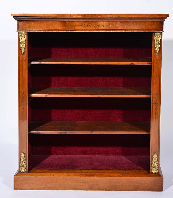 Appraisal: Victorian walnut open bookcasewith gilt metal mounts cm across