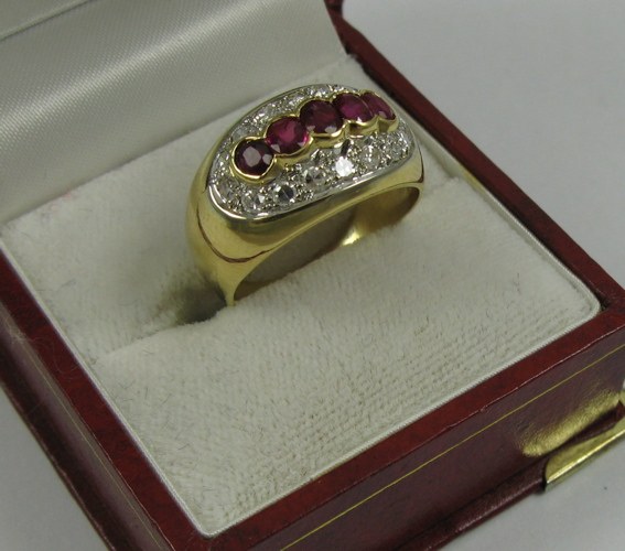 Appraisal: RUBY DIAMOND AND K GOLD RING set with five round-cut