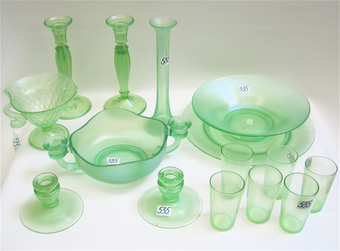 Appraisal: FIFTEEN PIECES GREEN STRETCH GLASS set of tumblers H pair