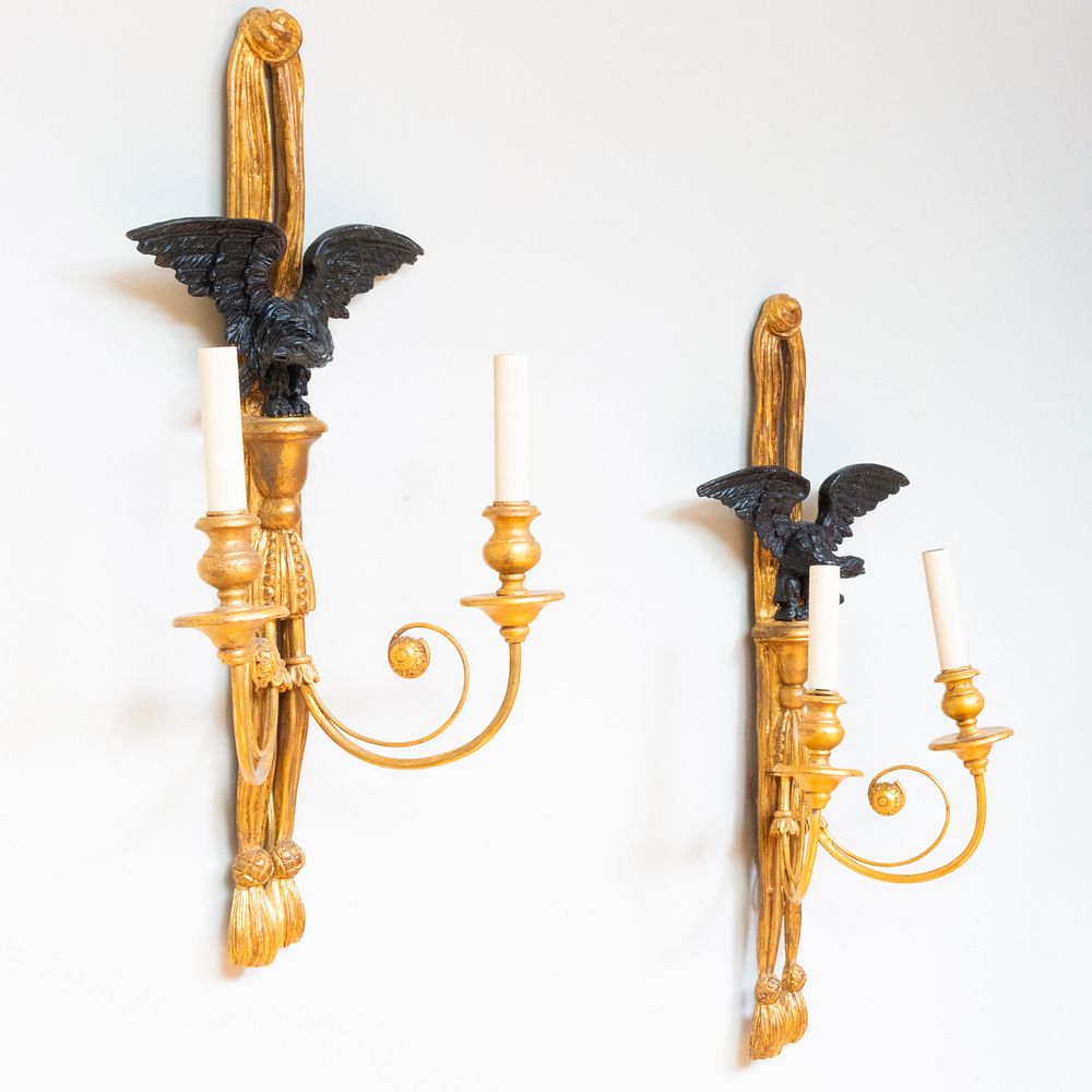 Appraisal: Pair of Giltwood Two-Light Wall Sconces with Carved Ebonized Eagles