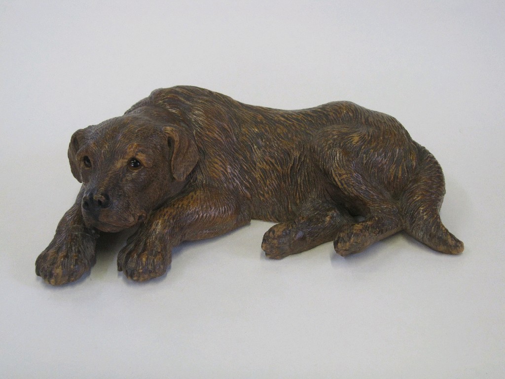 Appraisal: Blackforest style carved wooden figure of a dog def to