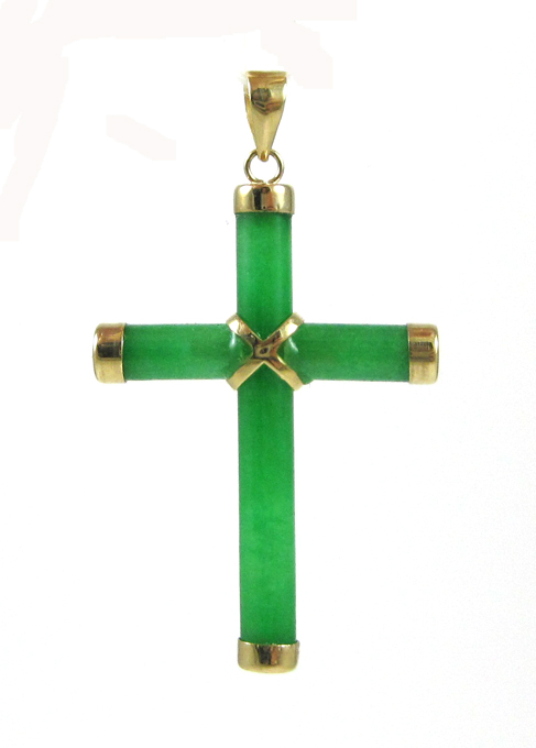 Appraisal: JADE AND FOURTEEN KARAT GOLD PENDANT The green jade and