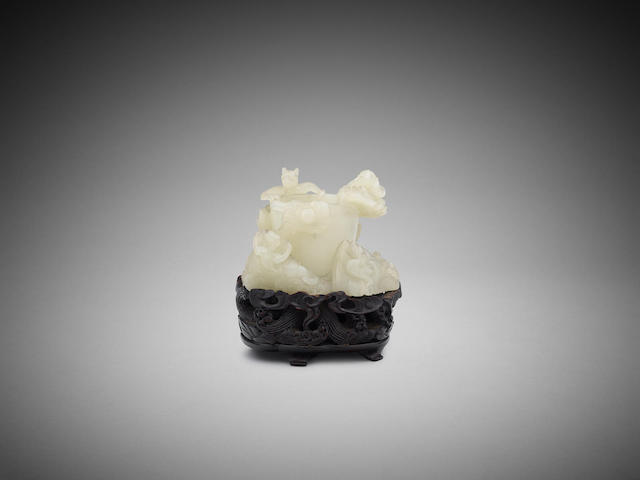 Appraisal: A Chinese carved white jade libation cup Qing dynasty cm