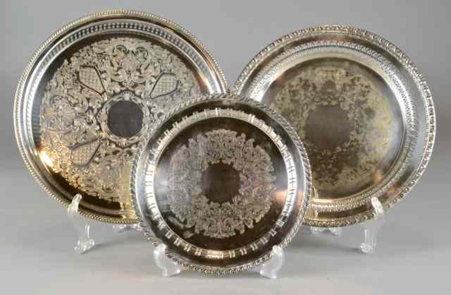 Appraisal: Silver Plated Serving TraysTo include a high sided circular tray