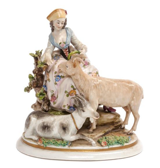 Appraisal: Sale Lot A Continental Porcelain Figural Group depicting a shepherdess