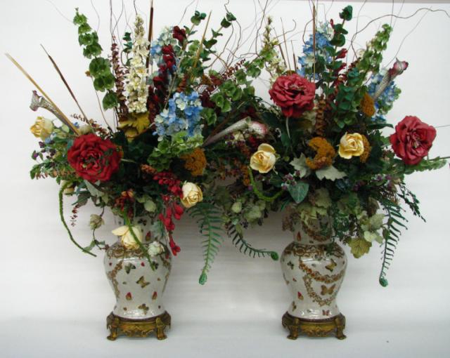 Appraisal: Pair of large silk floral arrangements in oriental style vases