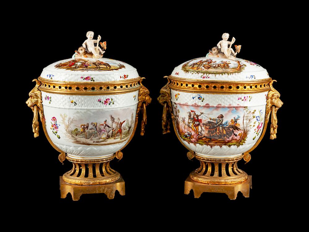 Appraisal: A Pair of Gilt-Bronze-Mounted German Porcelain Covered Urns on Stands