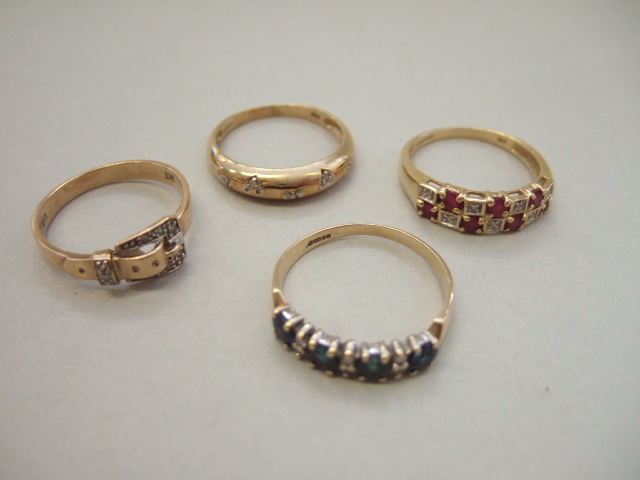 Appraisal: A ct gold ruby and diamond set half hoop ring