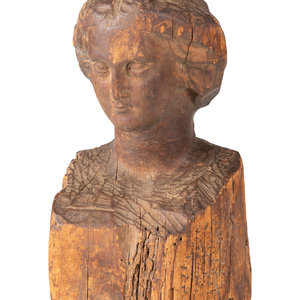 Appraisal: A Folk Art Carved Wood Female Head Height x width