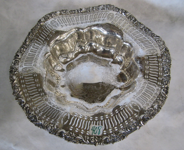 Appraisal: LARGE ROUND SILVER PLATED BOWL ornately pierced chased and engraved