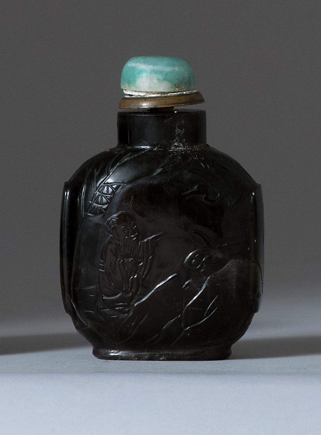 Appraisal: DARK TEA CRYSTAL SNUFF BOTTLE th CenturyIn ovoid form with