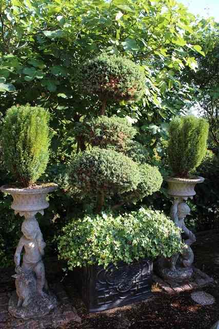 Appraisal: A PAIR OF FAUX LEAD CUBIC PLANTERS each with Georgian