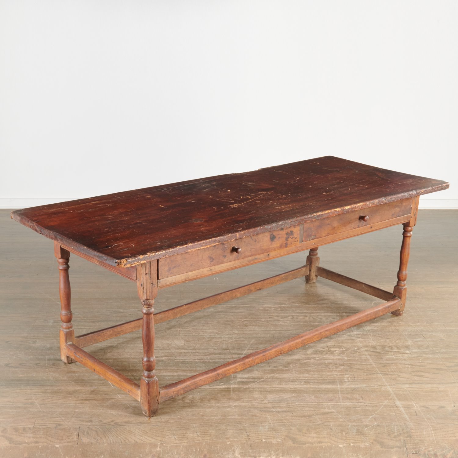 Appraisal: EARLY CONTINENTAL WALNUT FARM TABLE c th c with two