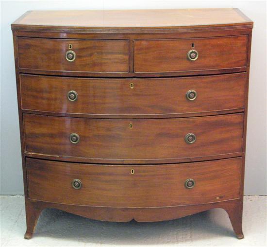 Appraisal: th century mahogany and ebony strung bow fronted chest of