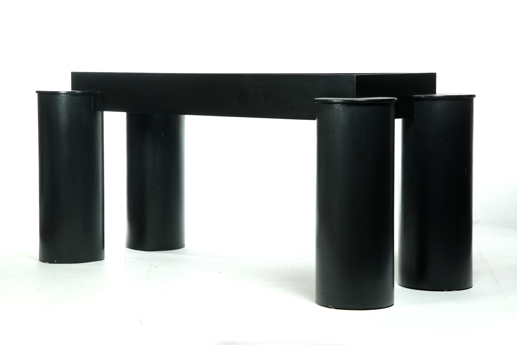 Appraisal: CONTEMORARY GRANITE-TOP TABLE Twenty-first century Black base with columnar legs