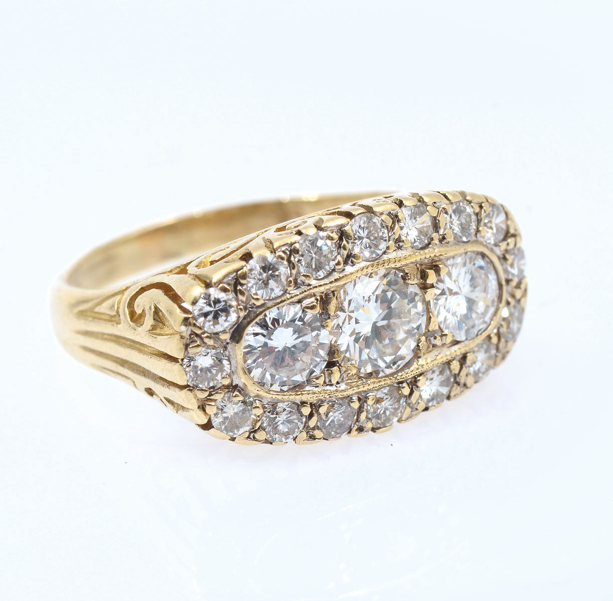 Appraisal: K DIAMOND EDWARDIAN REVIVAL RING round brilliant cut diamonds are