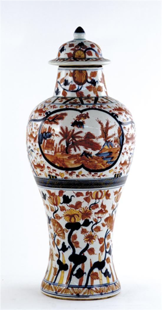 Appraisal: Japanese Imari porcelain covered urn domed cover on balustrade body