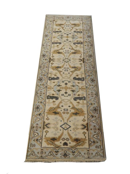 Appraisal: RUG Oushak runner '' x '' cream field with light