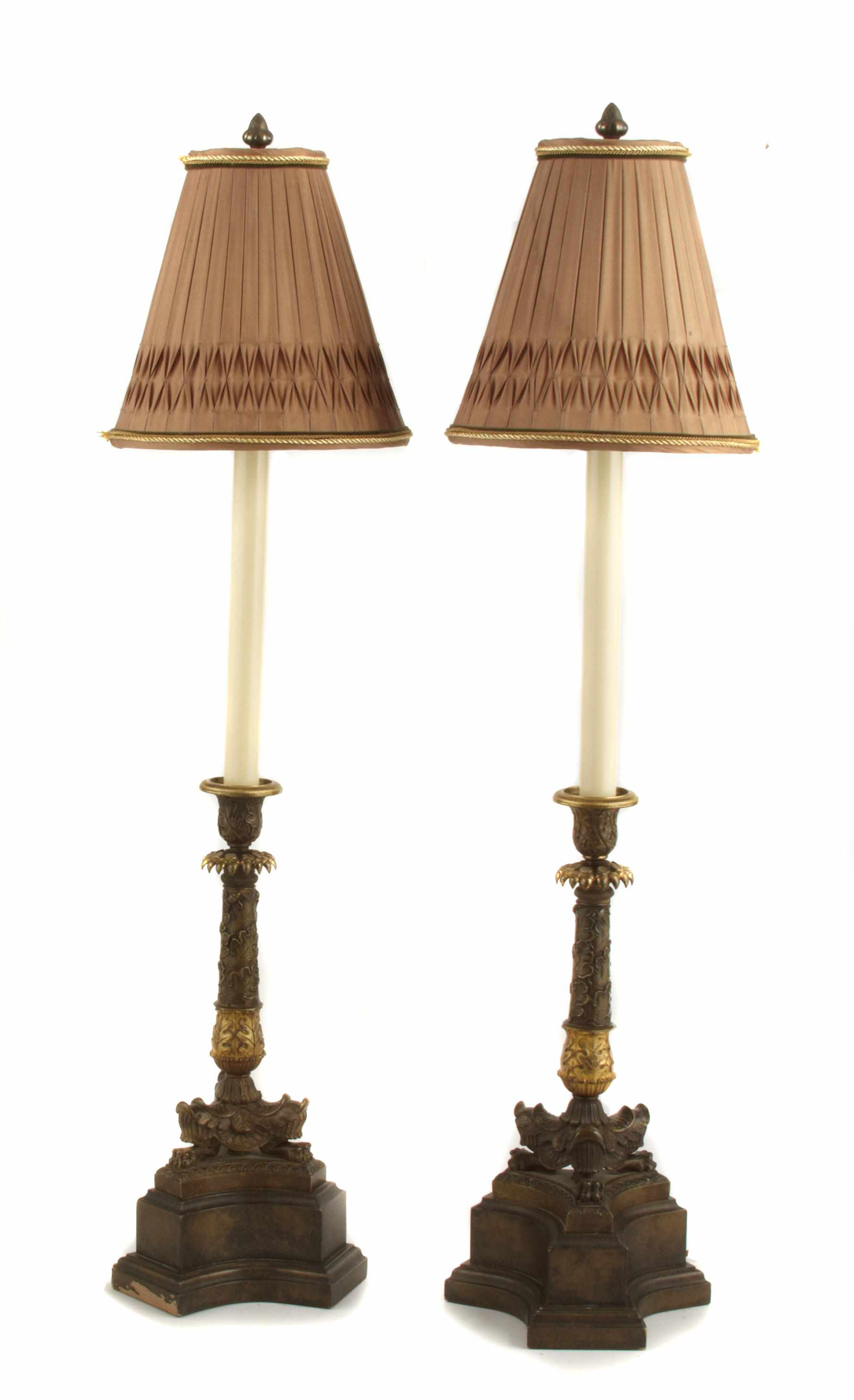 Appraisal: A pair of Empire style parcel gilt and patinated bronze