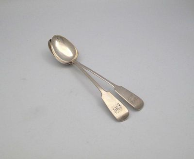 Appraisal: A pair of Victorian silver Fiddle pattern basting spoons by