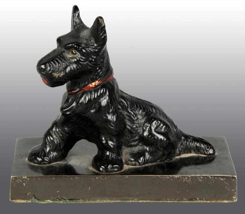 Appraisal: Cast Iron Scottie on Base Paperweight Description Hubley catalog number