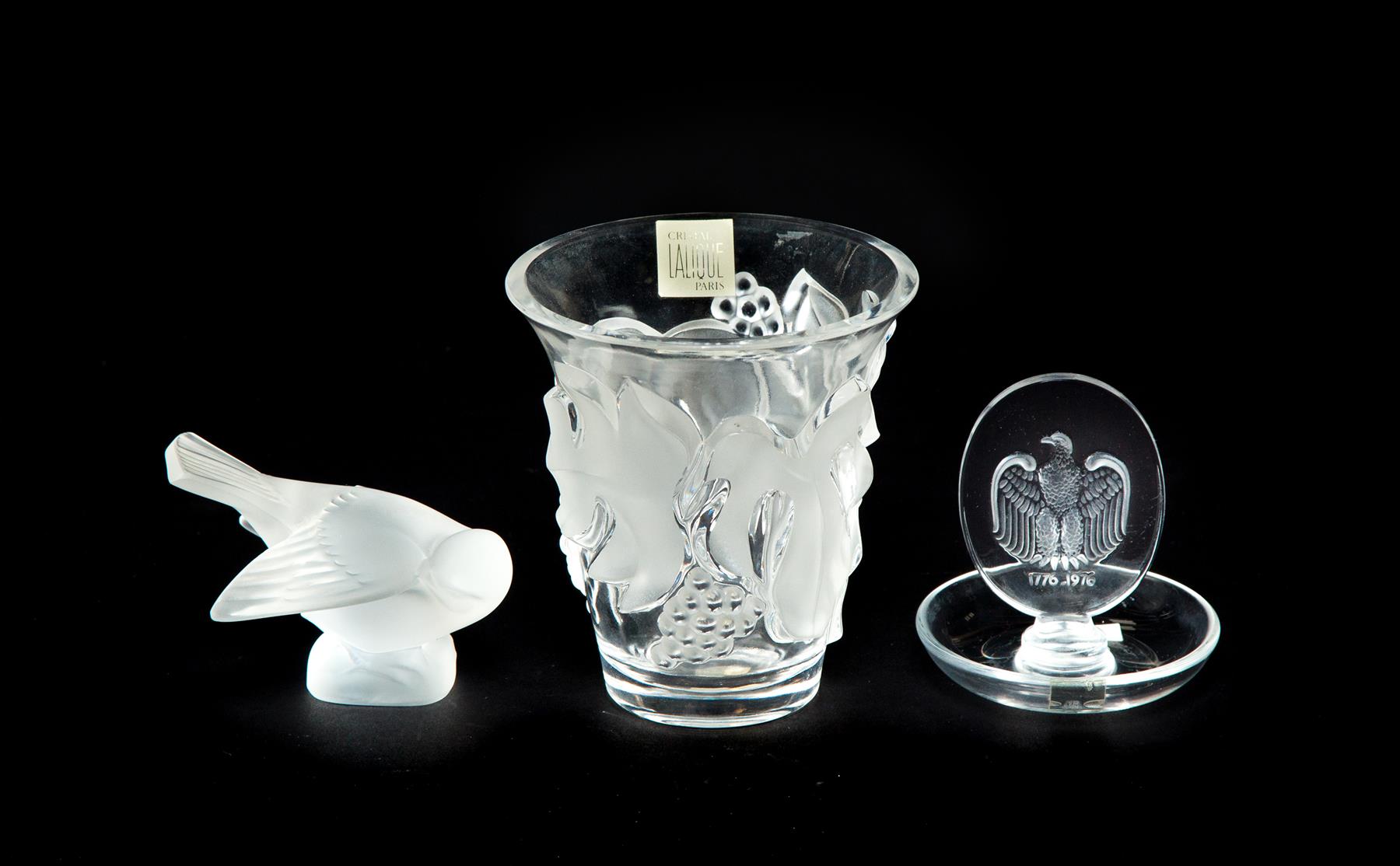 Appraisal: THREE PIECES OF LALIQUE CRYSTAL France th century Short vase