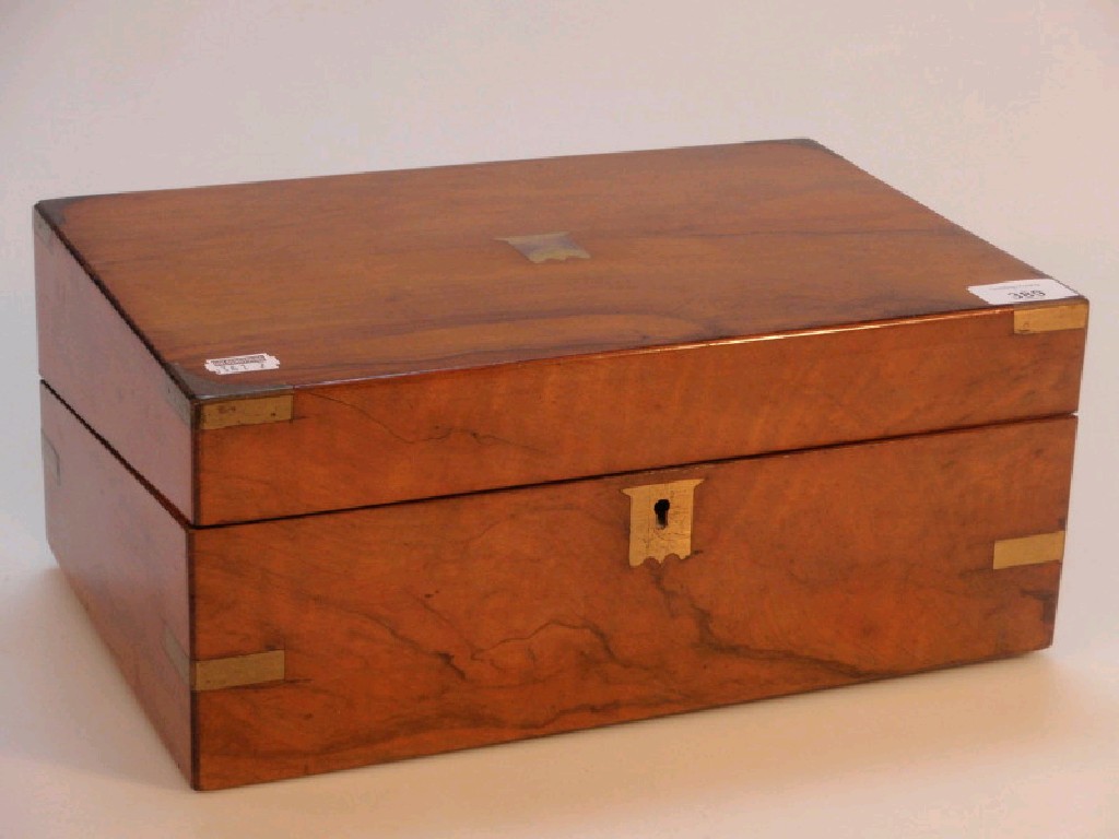 Appraisal: A Victorian brass-bound walnut writing box