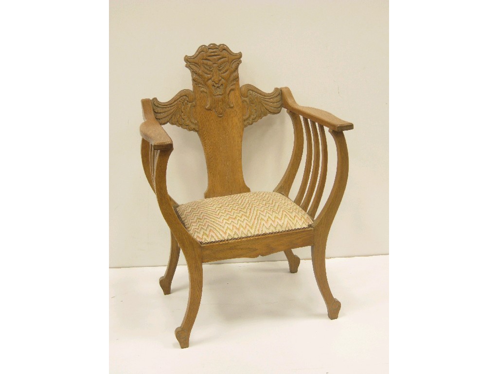 Appraisal: An Arts Crafts Throne Chair in light oak the back