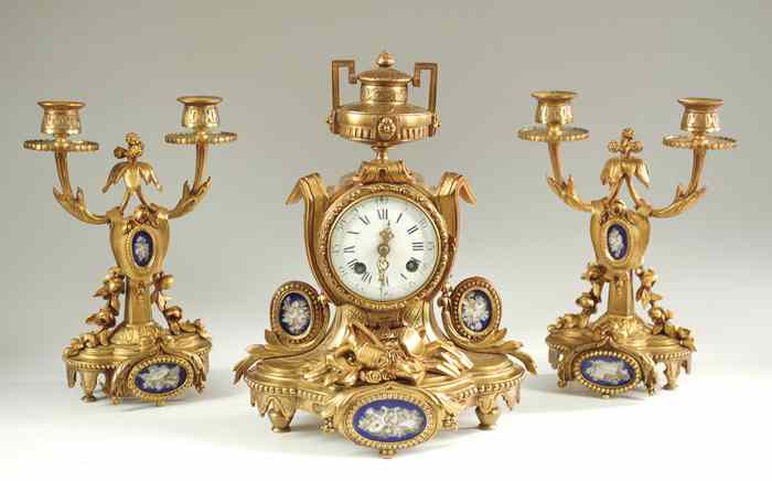 Appraisal: THREE-PIECE GILT BRONZE CLOCK SET French th century the set