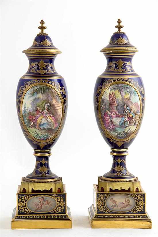 Appraisal: Pair Sevres style ormolu-mounted porcelain covered urns on stands late