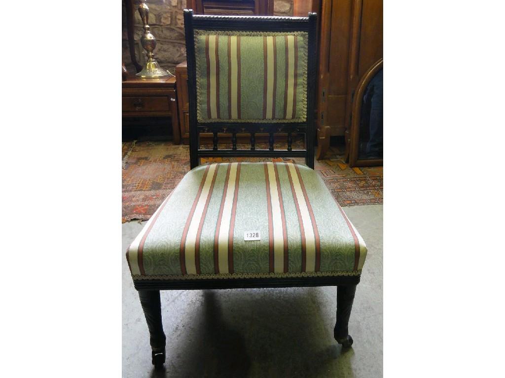 Appraisal: A aesthetic movement period nursing occasional chair with upholstered seat