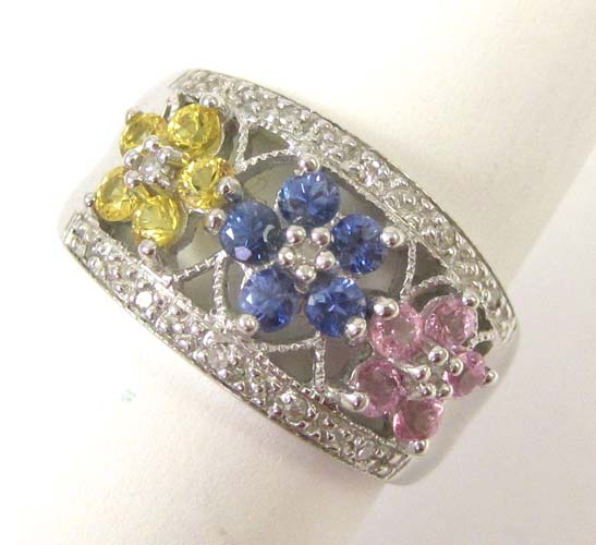 Appraisal: MULTI-COLOR SAPPHIRE AND DIAMOND RING The k white gold ring