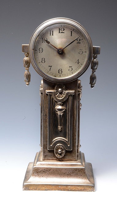 Appraisal: AN ART NOUVEAU MANTEL TIMEPIECE with silvered Arabic dial the