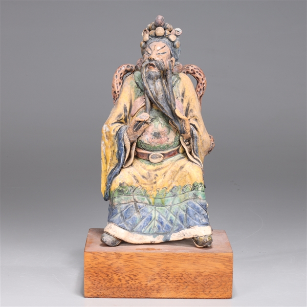 Appraisal: Antique Chinese glazed ceramic roof tile seated figure mounted on