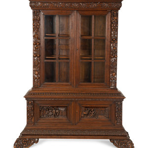 Appraisal: A German Black Forest Carved Oak Bookcase Late th Century