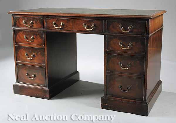 Appraisal: A Regency-Style Mahogany Kneehole Desk th c paper label Beacon