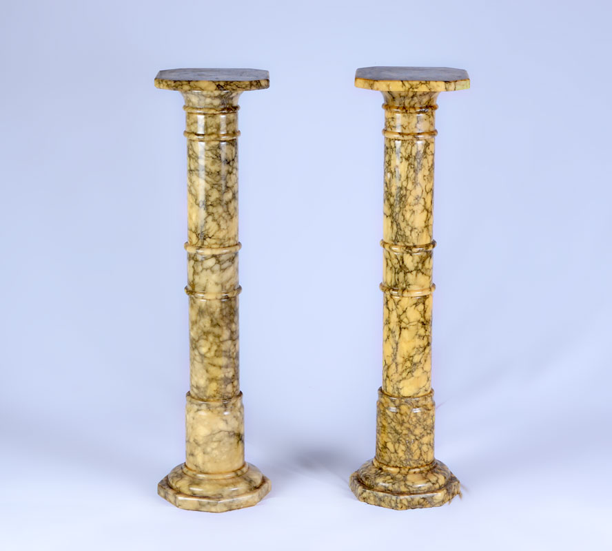 Appraisal: PAIR OF MARBLE PEDESTALS Variegated yellow hued marble removable top