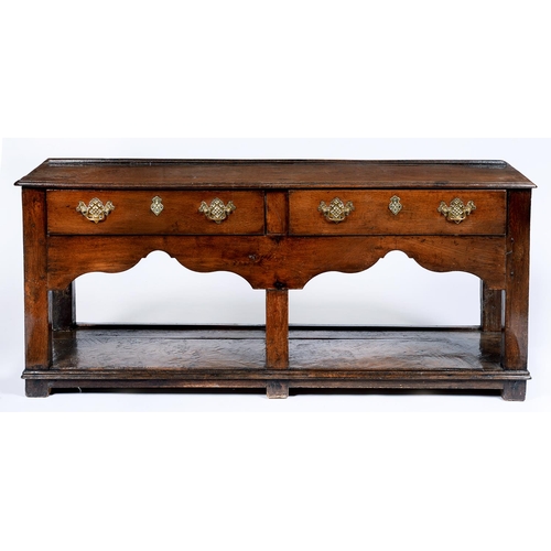 Appraisal: A George III oak dresser the top with moulded lip