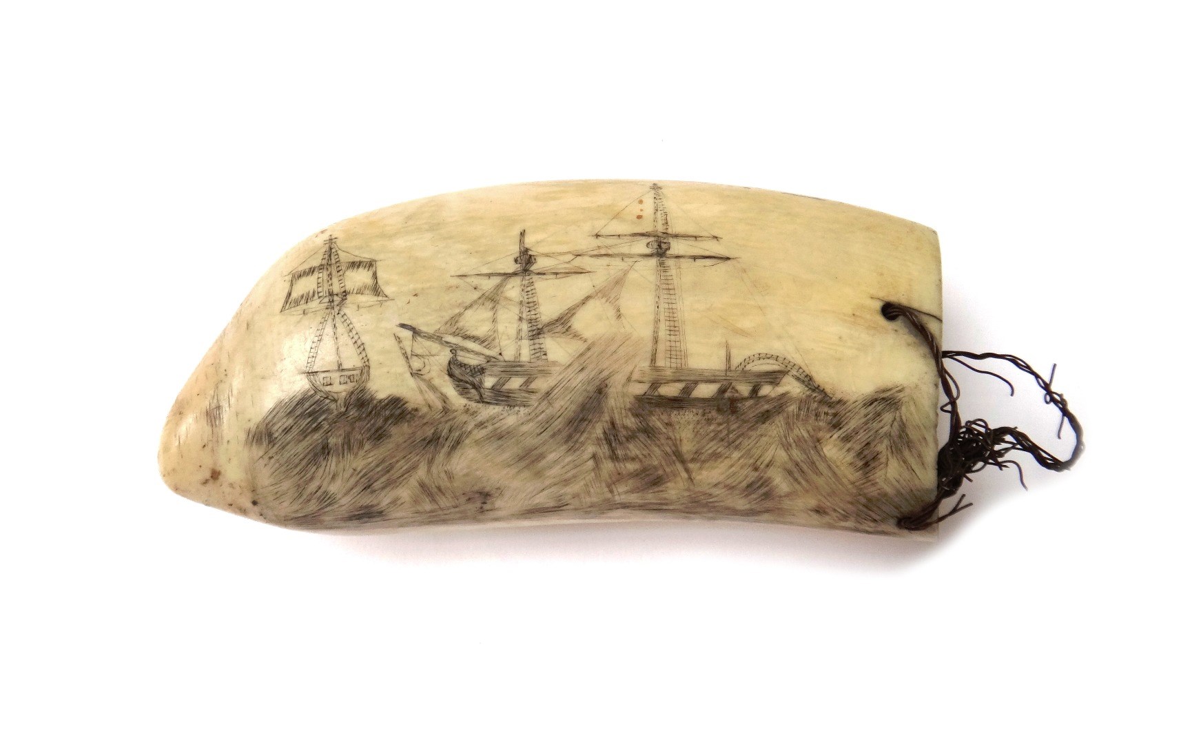 Appraisal: A scrimshaw whale's tooth mid th century decorated with two