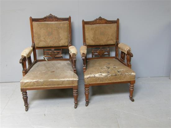 Appraisal: Pair of early th century rosewood and parquetry inlaid armchairs