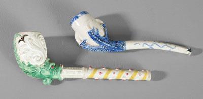 Appraisal: Two figural pipes one pearlware and shaped as talon holding