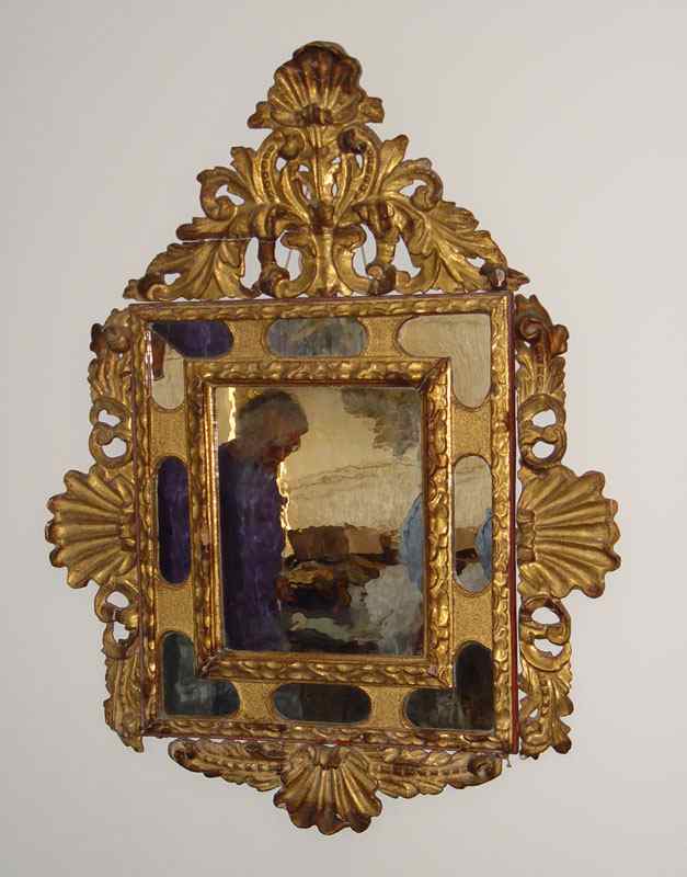 Appraisal: CARVED GILT WOOD HALL MIRROR Carved and pierced with shell