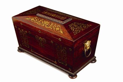 Appraisal: A George IV rosewood and brass marquetry sarcophagus shape tea