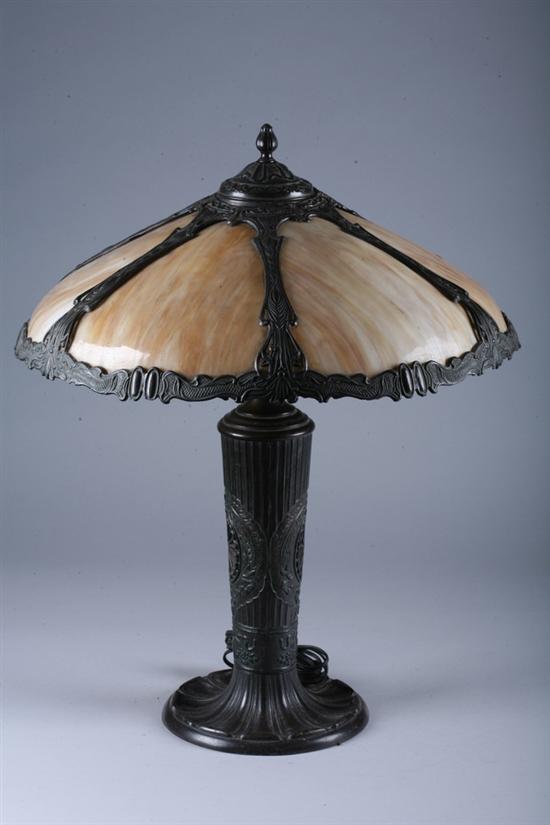 Appraisal: METAL LAMP WITH SLAG GLASS SHADE Circa Damage to metal