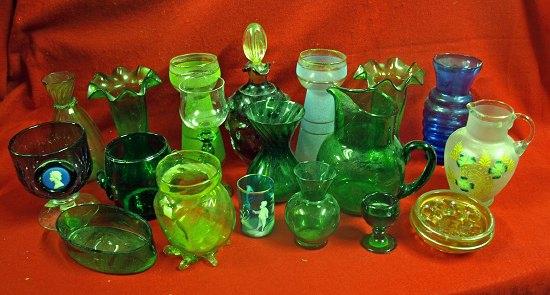 Appraisal: A pair of green glass vases with wavy rims and