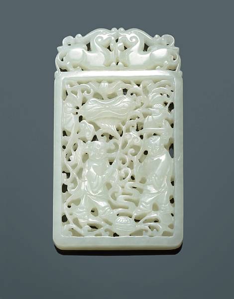 Appraisal: A white jade pendant Finely reticulated within a rectangular frame