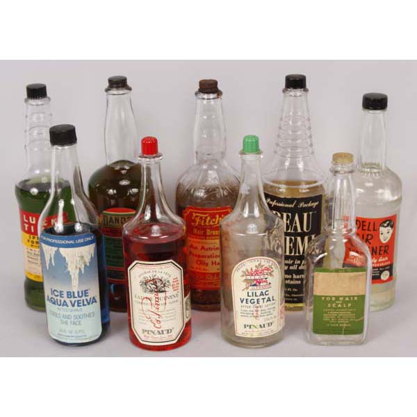 Appraisal: Collection of barber back bar glass bottles with paper labels