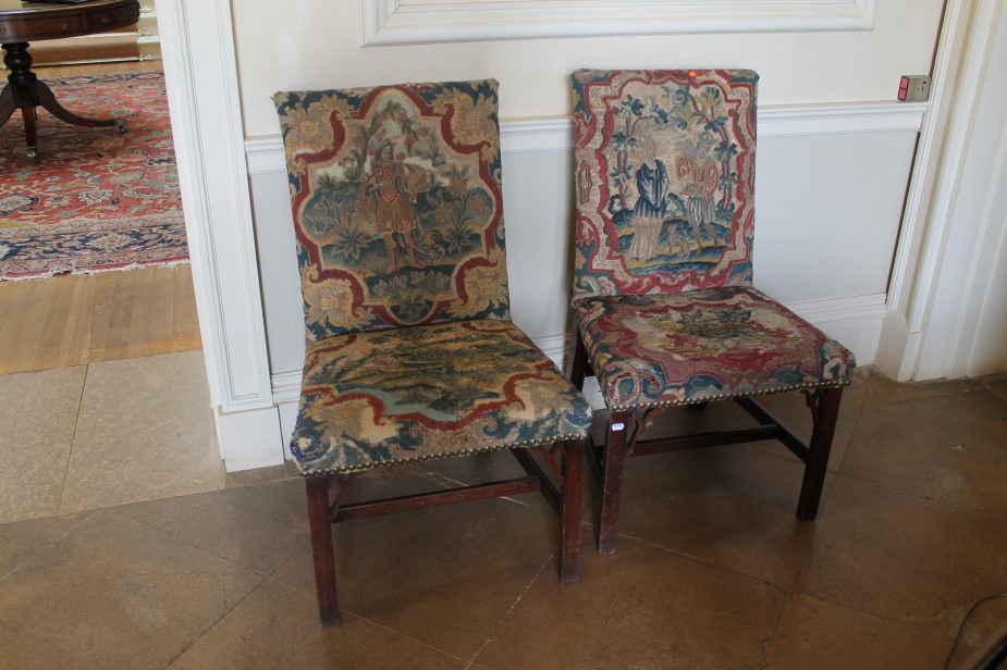 Appraisal: A pair of late thC mahogany hall or side chairs